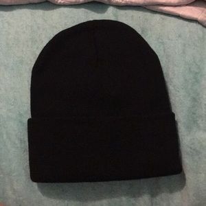 One plain black beanie